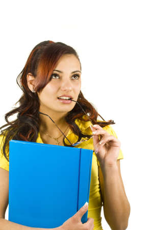 Female student isolated over a white background の写真素材