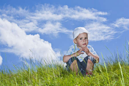 happy boy having fun outdoors の写真素材