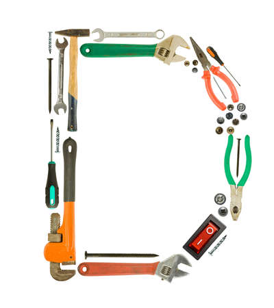Letter 'D' made of tools isolated on white の写真素材
