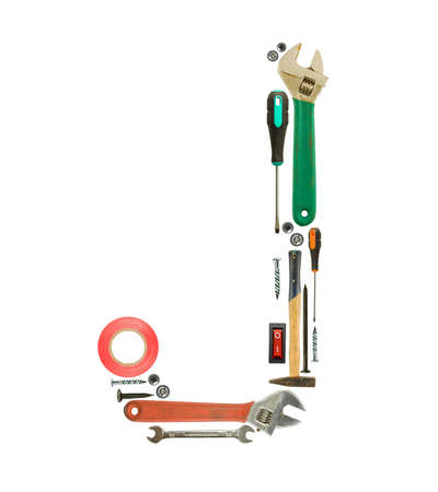 Letter 'J' made of tools isolated on white の写真素材