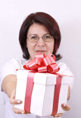 business surprised woman looking a giftの写真素材