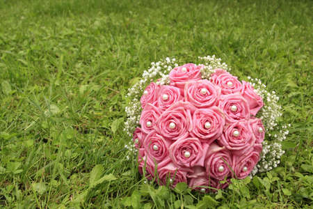 Wedding flowers on the grassの写真素材