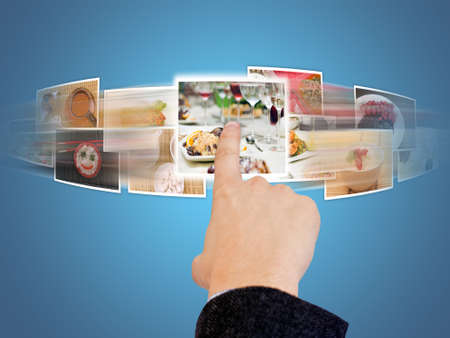 hand selecting images streaming from the deepの写真素材