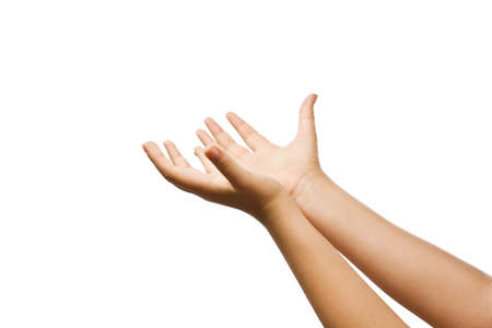 Open hands hopefully held up high. の写真素材