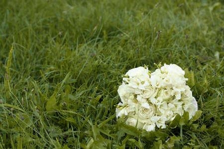 Wedding flowers on the grassの写真素材