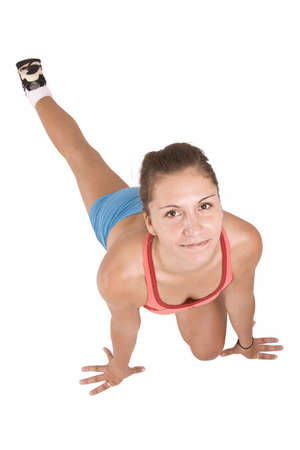 Attractive brunette girl doing fitness excersises の写真素材