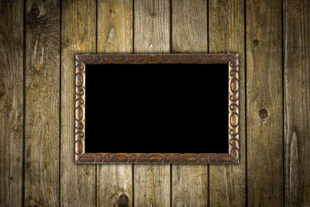 picture frame on old wooden wall の写真素材