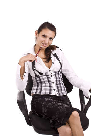 business woman sitting on a chair isolated over white の写真素材