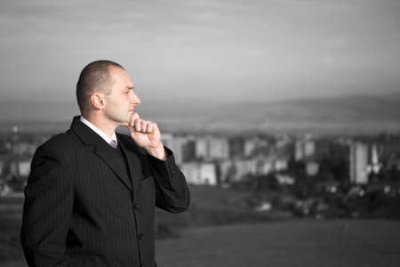 Business Man city in the backgroundの写真素材