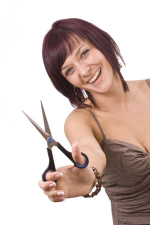 Female cutting  herself  isolated in whiteの写真素材