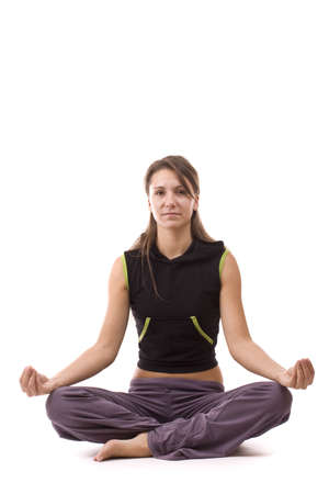 Young woman doing yoga exercise の写真素材