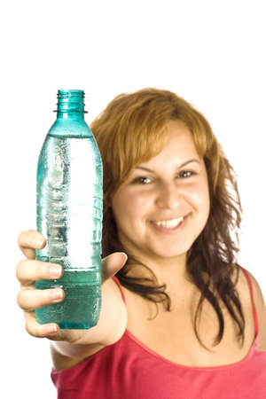 beautiful woman with bottle of water over white の写真素材