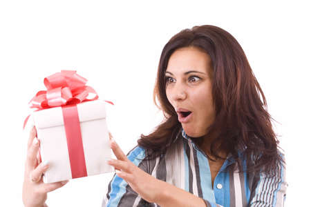 surprised Girl holding a gift , on white background. 