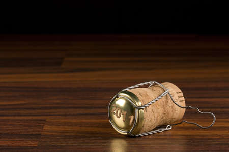champagne cork in black selective focus 