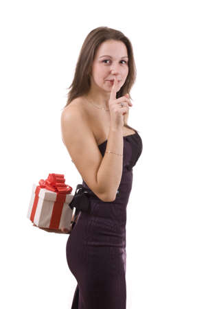 Girl holding a gift , on white backgroundの写真素材