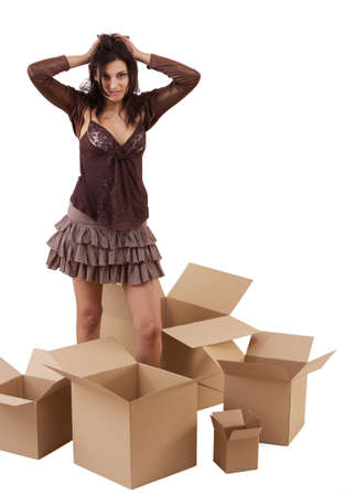 Attractive woman with box making a removal の写真素材