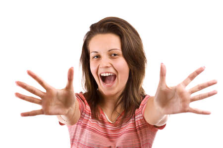 Portrait of excited young woman pointing with both hands towards the camera isolated on white 