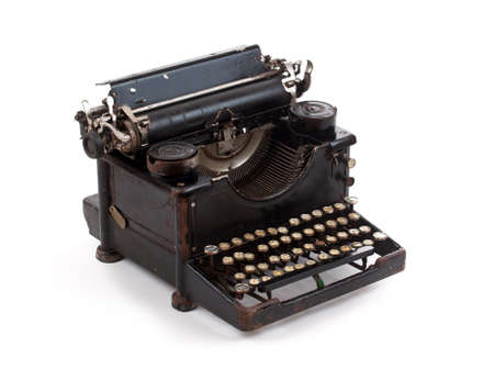 Old fashioned typewriter isolated on white background 
