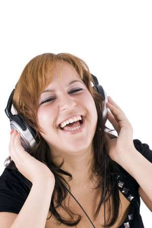 beautiful happy woman listening to music の写真素材