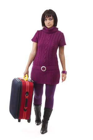 Woman going for traveling with her red suitcase の写真素材