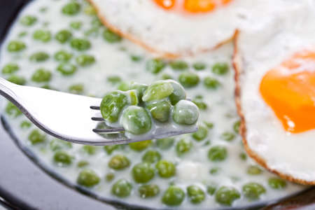 Peas whit eggs serving in restaurantの写真素材