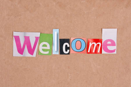 Welcome, letters sorted on paper backgroundの写真素材