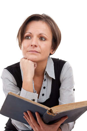 Thinking attractive young business woman with book over white の写真素材