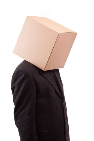 Businessman with a brown box on his headの写真素材