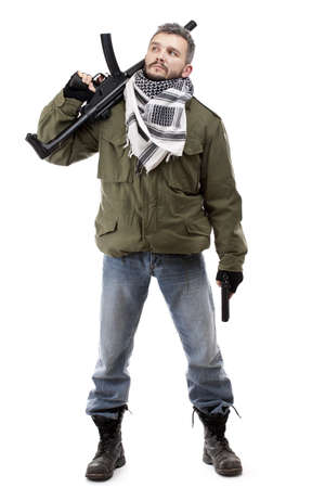 Terrorist with rifle, isolated on white backgroundの写真素材