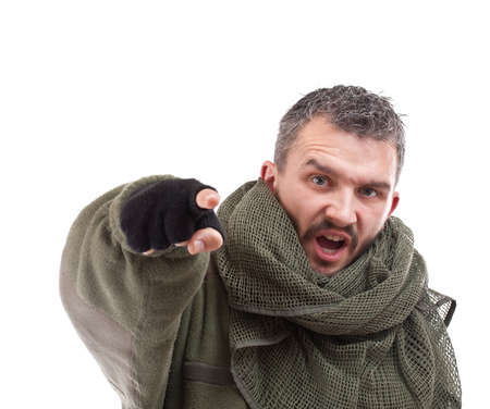 Terrorist pointing his finger for you, isolated on white backgroundの写真素材