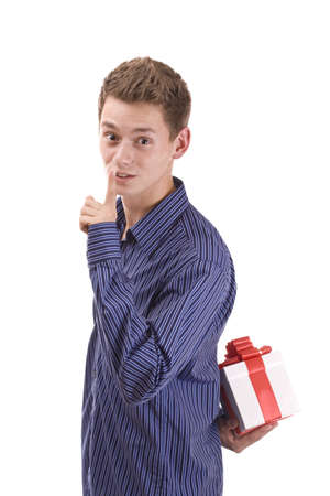 young man with a wrapped gift box for youの写真素材