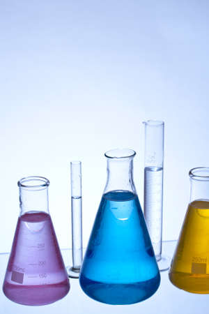 chemical laboratory glassware equipment with color liquidの写真素材