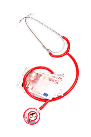 Red stethoscope is over euro money background. の写真素材