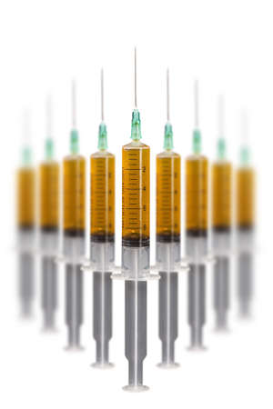 Many syringe with liquidの写真素材