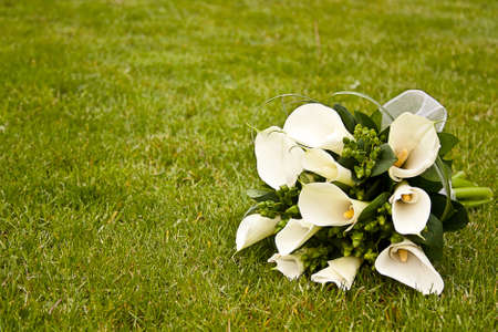 Wedding flowers on the grassの写真素材