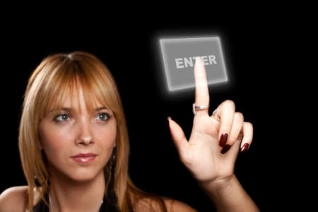 woman pressing a touchscreen button の写真素材