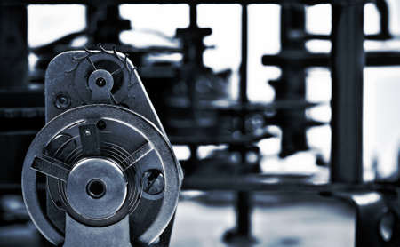 cogwheels in old clock 