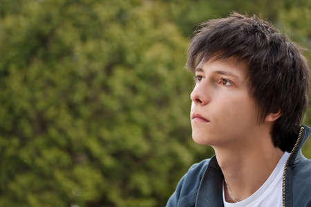 Outdoors portrait of atractive young man の写真素材