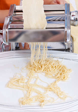 Simple homemade noodles and pasta machineの写真素材