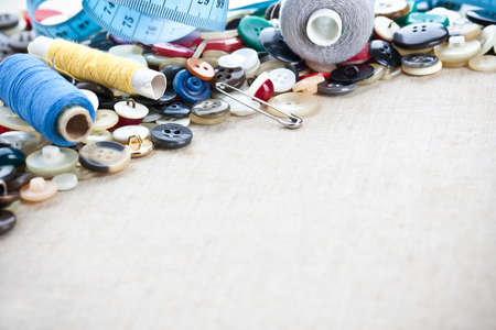 Buttons frame on fabric texture background 