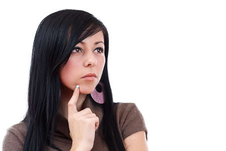 Closeup of an attractive young woman thinking, isolated on white background