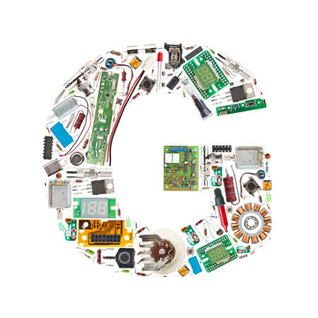 Letter 'G' made of electronic components isolated in white backgroundの写真素材