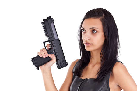 Serious woman is aiming a handgun, isolated on white