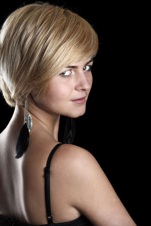 Beautiful blond woman on black