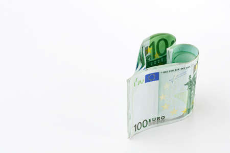 Money heart isolated on white background 