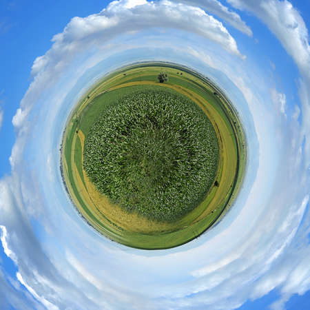 Little planet panorama whit cloud and field