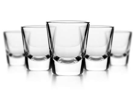 Glass of vodka on white backgroundの写真素材