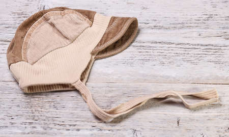 Blue cap on old painted woodの写真素材