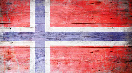 Flag of Norway painted on grungy wood plank background の写真素材