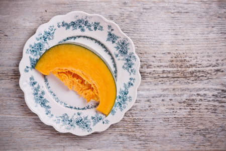 Autumn still life with sliced pumpkinの写真素材